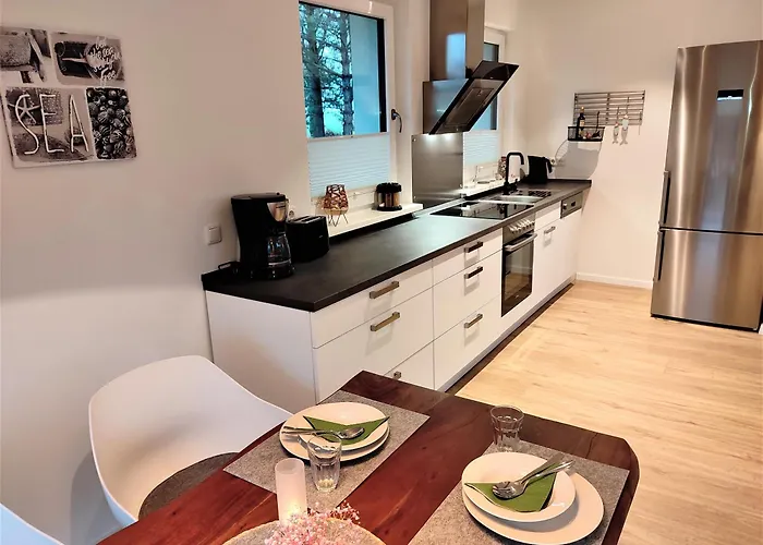 Strandmuschel Feriehus *